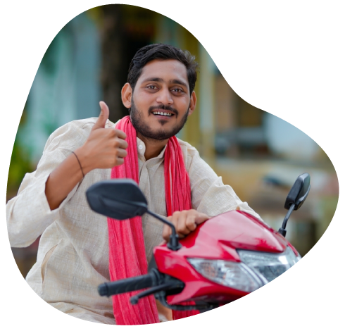 Happy customer on red scooter endorsing Manba Finance's two wheeler loan